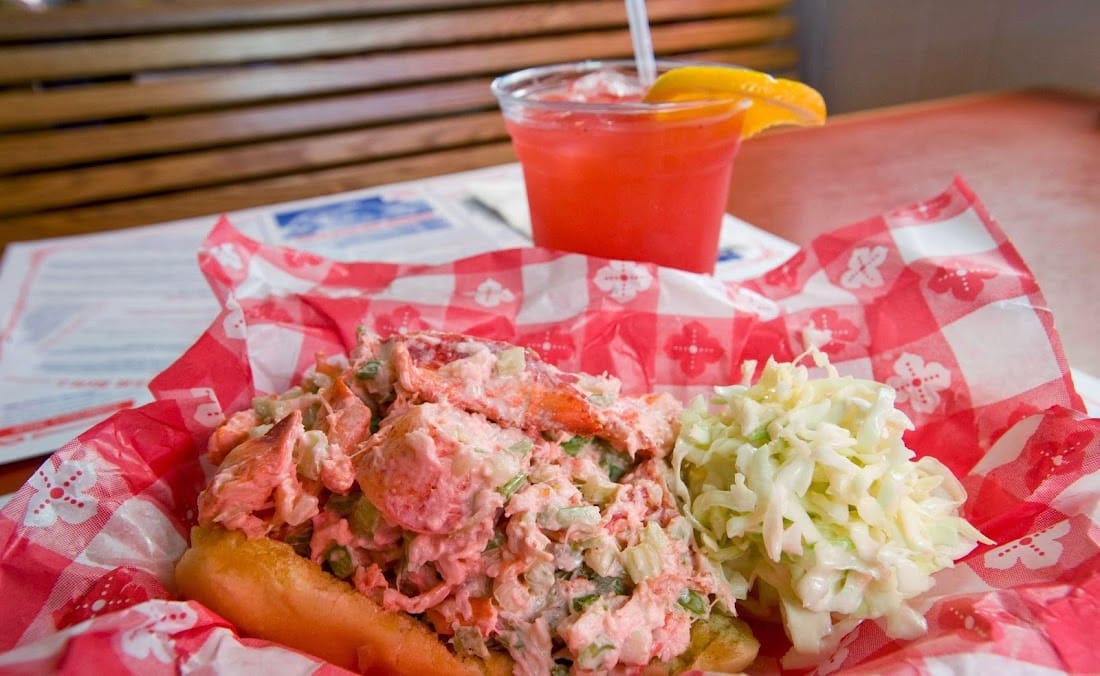 The Lobster Roll's overstuffed lobster roll in a basket